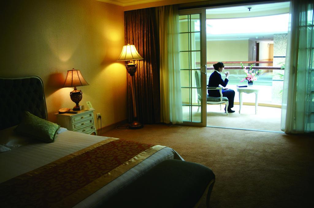 New Gloria Plaza Garden Hotel Harbin Room photo