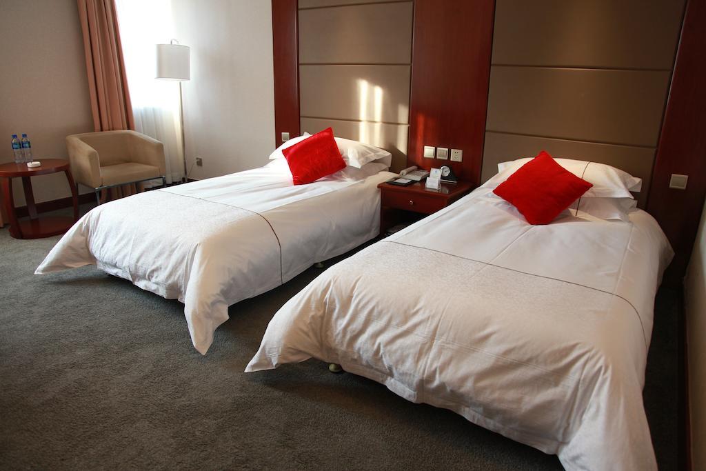 New Gloria Plaza Garden Hotel Harbin Room photo