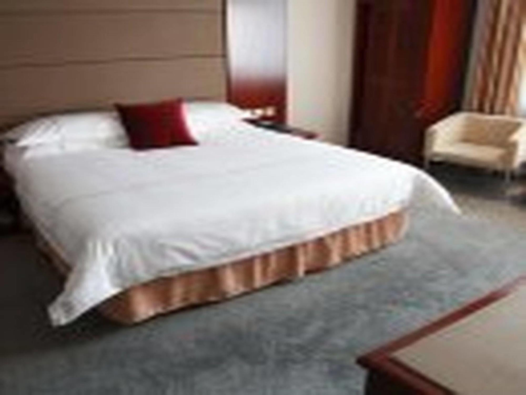 New Gloria Plaza Garden Hotel Harbin Exterior photo